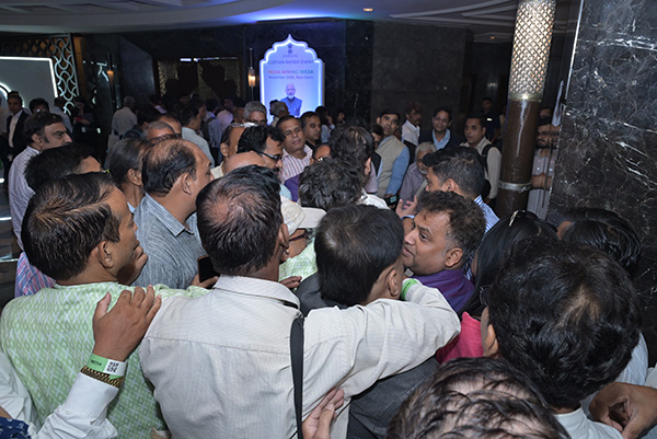 Delegates seated at a technical session in a conference hall